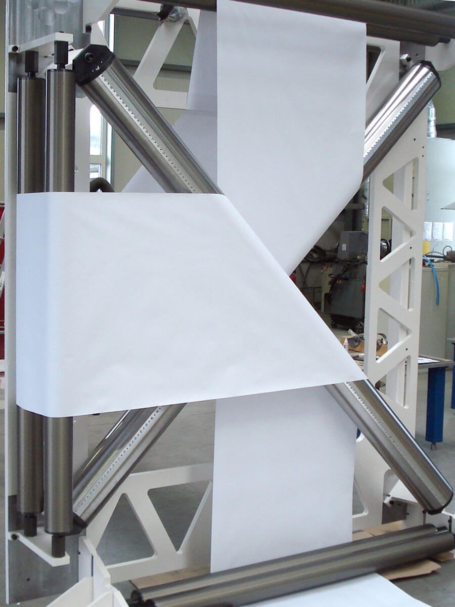 BACH Wendeeinrichtungen: Wendekreuz mit mikroporösen Wendestangen für die Papierindustrie